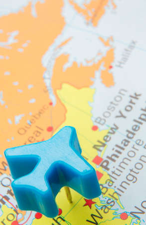 Model Aeroplane Over Map Of New Yorkの写真素材