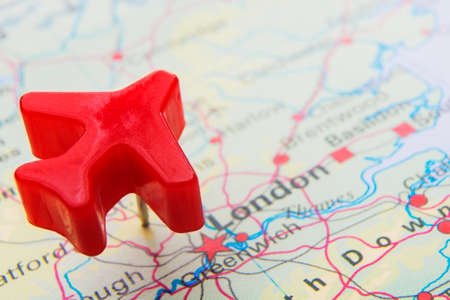 Model Aeroplane Over Map Of Londonの写真素材