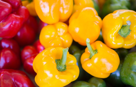 Close Up Of Colorful Bell Peppers On Market Stall