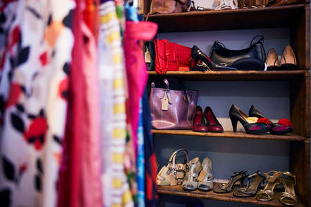 Interior Of Charity Shop Or Thrift Store Selling Used And Sustainable Clothing Shoes And Handbagsの写真素材