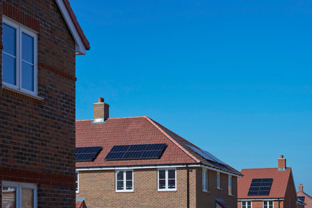 Close Up Of New Housing Development Including Solar Energy Panels On Roofの写真素材