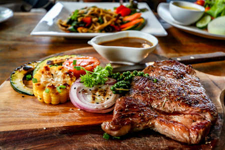 Sirloin Steak On a wooden plate
