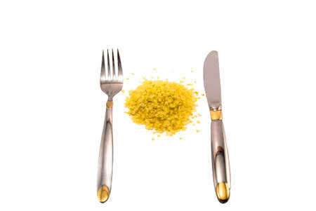 fork, knife, quick-cooking flakes on a white background