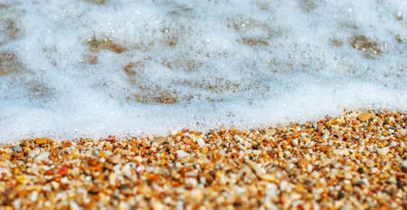 Sea wave is incident on the coastal sandの写真素材