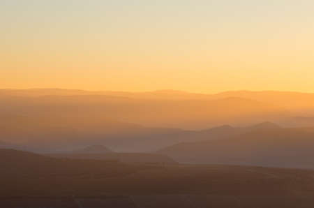 Haze in the mountains during dawnの写真素材