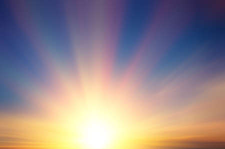 Beautiful sun with rays at sunset. Abstract compositionの写真素材