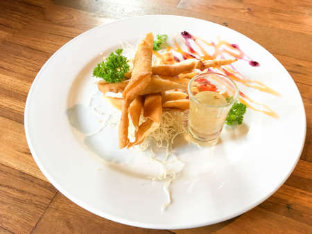 Spring rolls with shrimp with sweet sauce.の写真素材