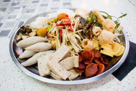 Papaya salad is a popular trays, Somtam tad.