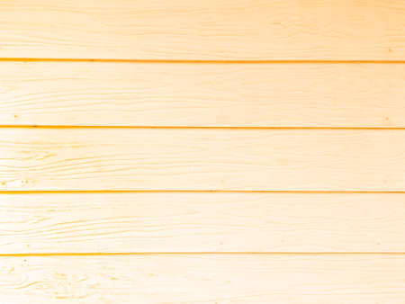 Orange wood wall texture and background.の写真素材