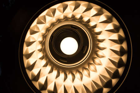 Lamp down light in the dark on the top wall.の写真素材