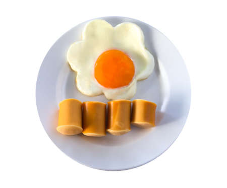 Top view fried egg with sausage isolated on white disk background.の写真素材