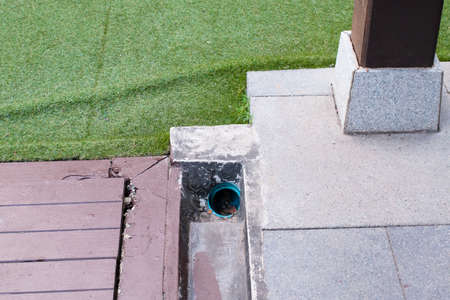 Drainage in the garden floor clog up background texture.