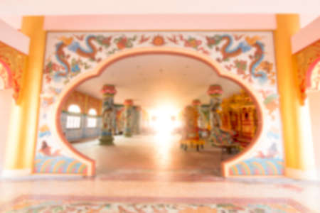 Blur image Chinese doors with sunlight background texture in Thailand.の写真素材