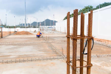 Construction worker is steel wire tie working at outdoor.の写真素材