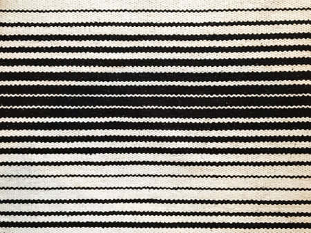 Seamless close up black and white carpet texture background from above. decoration interior element of room.の写真素材