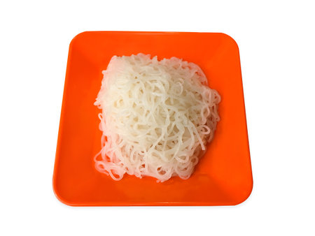 Rice noodles in plate of cooked isolated on white background, Eat with papaya salad. Asia food, Top view, Clipping path.の写真素材