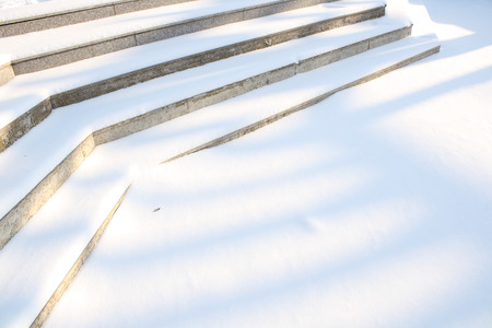 Stairs covered in snowの写真素材