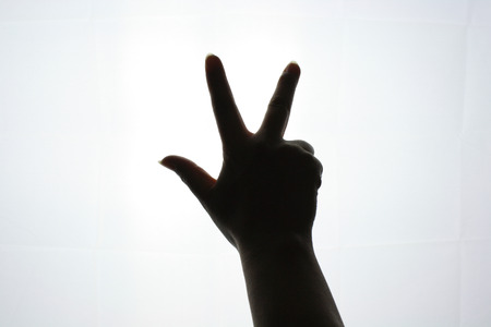 Hand gesture silhouetteの写真素材