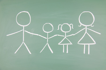 Family drawn on a blackboardの写真素材
