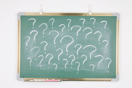 Question mark drawn on a blackboardの写真素材