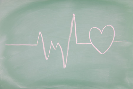 Heart drawn on a blackboardの写真素材