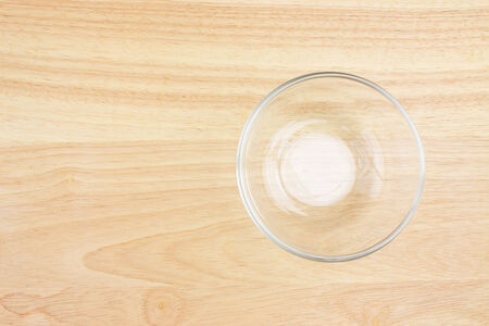 empty bowl on wooden tableの写真素材