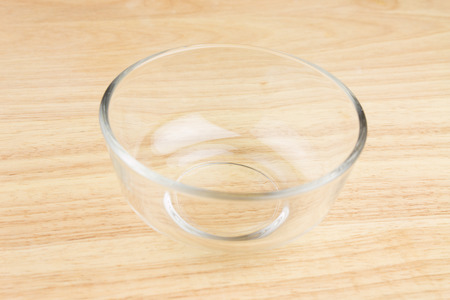 empty bowl on wooden tableの写真素材