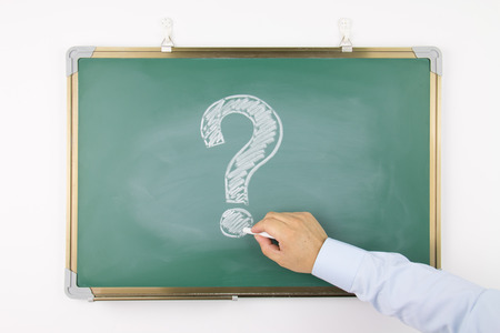Question mark drawn on a blackboardの写真素材