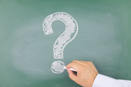 Question mark drawn on a blackboardの写真素材