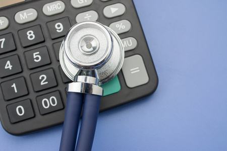 Stethoscope and calculatorの写真素材