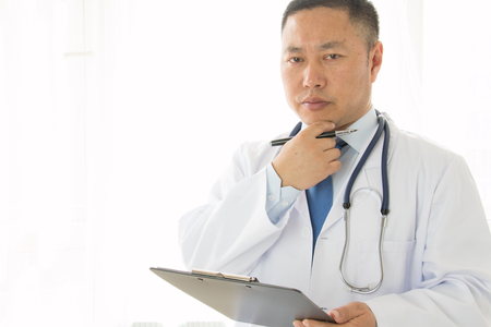 Asian male doctors at workの写真素材