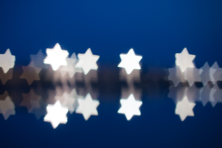 Fuzzy star shaped lights, defocused backgroundの写真素材