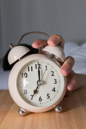 Close Up man morning off the alarmの写真素材