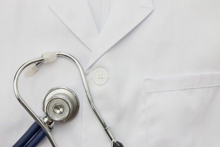 Stethoscope on a doctor's coatの写真素材