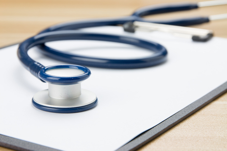 Stethoscope in doctors deskの写真素材