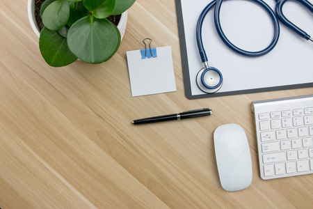 Stethoscope in doctors deskの写真素材