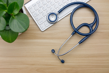 Stethoscope in doctors deskの写真素材