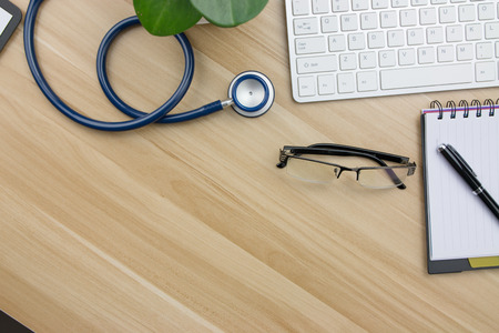 Stethoscope in doctors deskの写真素材