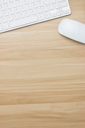 Office supplies on the wooden deskの写真素材