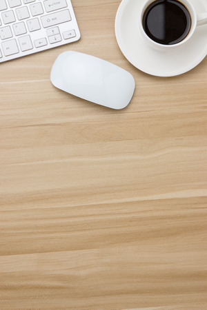 Office supplies on the wooden deskの写真素材