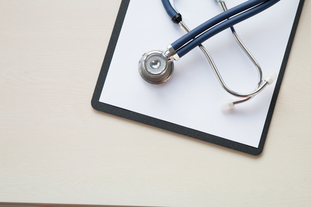 Stethoscope in doctors deskの写真素材