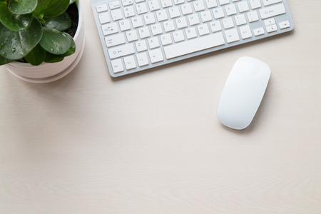 Office supplies on the wooden deskの写真素材