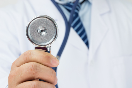 Doctor holding a stethoscope auscultationの写真素材