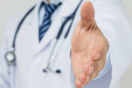Doctor ready to shake handの写真素材