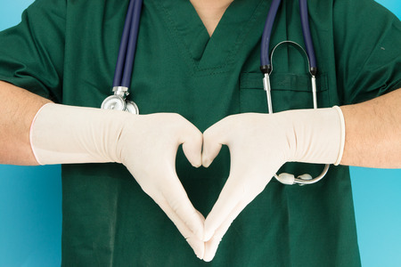 Doctors hands making heart-shapedの写真素材