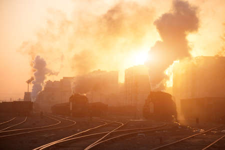 Steam locomotive at sunset