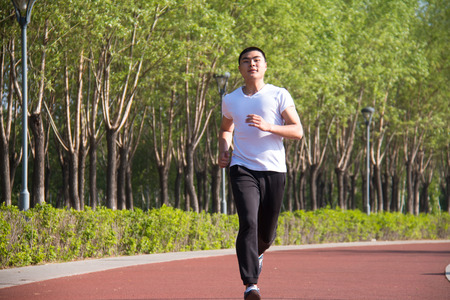 Young Asian man in the runningの写真素材