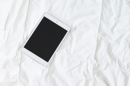 Smartphone in bedの写真素材