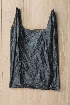 Plastic bags on the woodの写真素材