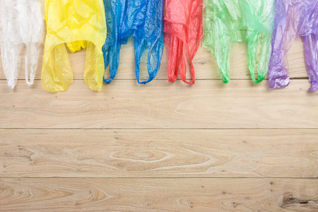 Plastic bags on the woodの写真素材
